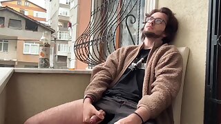 Russian stud jerking off and smoking in balcony