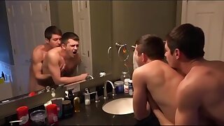 Two jock bros sneak off to the bathroom to fuck bareback