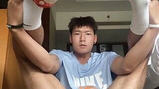 Young chinese athletic student