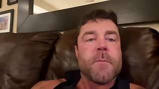 He jerks off and shoots his cum load all over shot glass