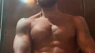 Hot muscular bearded guy cumming