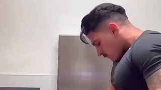 Hunky Latino Fucks muscular black guy in public toilet