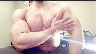Oiled up bodybuilder