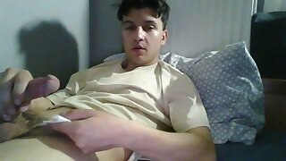 He jerks off in his dorm room until he shoots his cum load