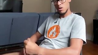 Black twink with glasses jerking off