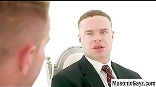 Businessman in White Suit Gives Intense Handjob to Muscular Man